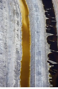 channels around fertilizer waste impoundment